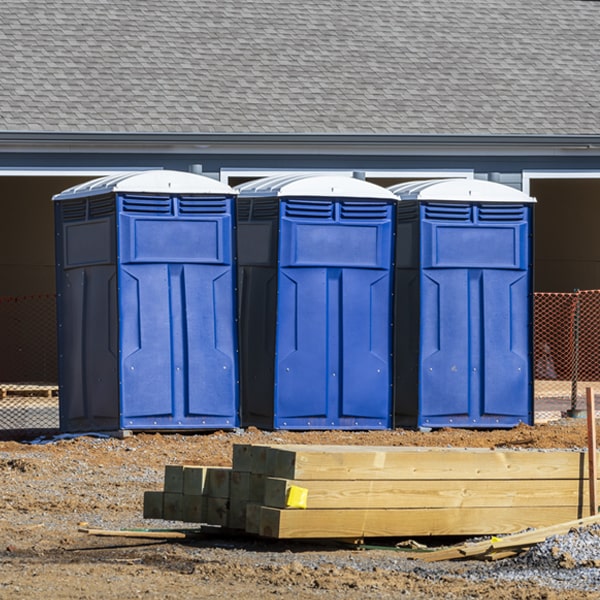 what is the cost difference between standard and deluxe portable restroom rentals in Lilbourn